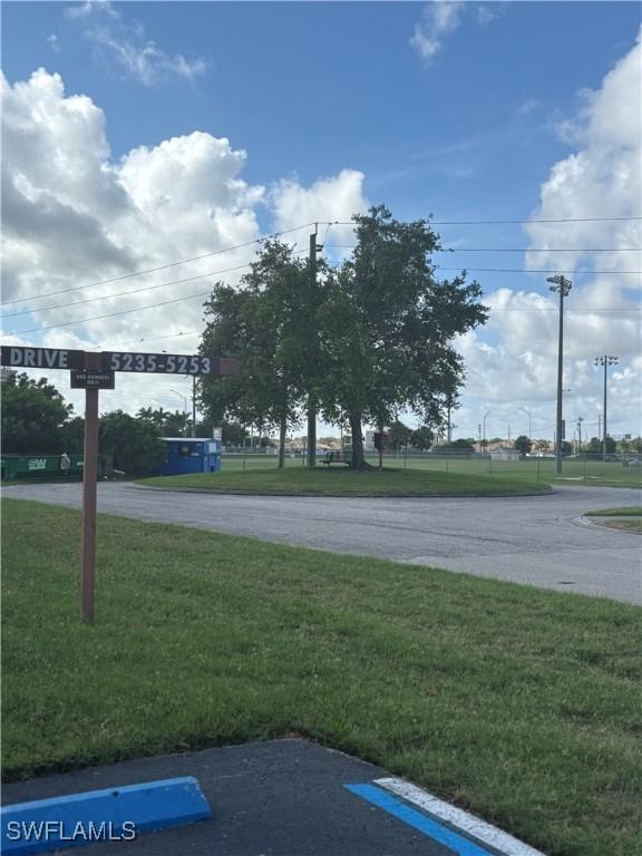5245 Cedarbend Dr Unit 4, Fort Myers, FL 33919 - view of parking / parking lot
