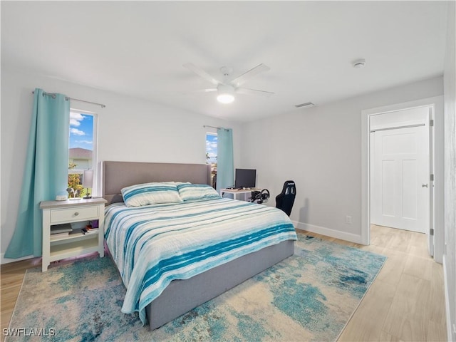 505 Monterey Ave, Cape Coral, FL 33904 - bedroom with wood finished floors and ceiling fan