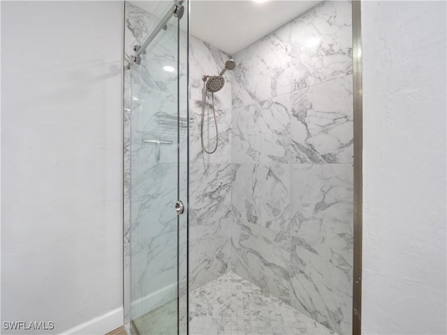 505 Monterey Ave, Cape Coral, FL 33904 - bathroom with a marble finish shower and baseboards