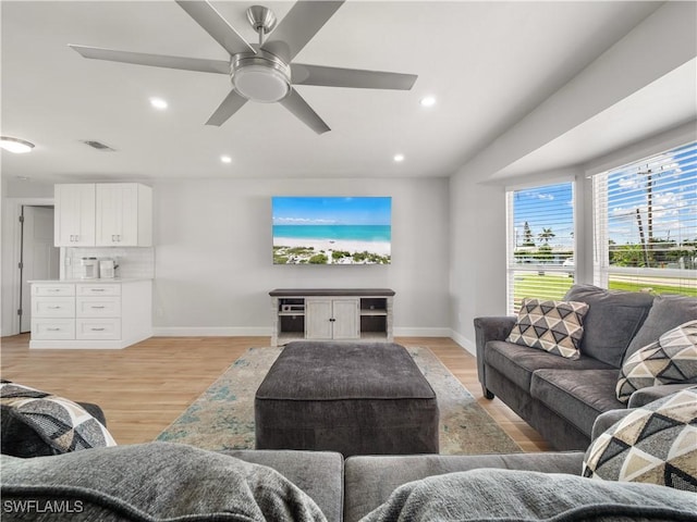 505 Monterey Ave, Cape Coral, FL 33904 - living area featuring light wood finished floors, a ceiling fan, and recessed lighting
