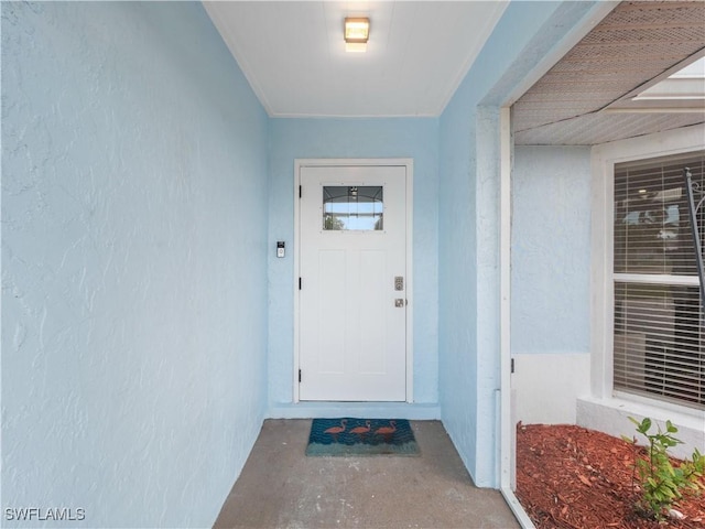505 Monterey Ave, Cape Coral, FL 33904 - property entrance featuring stucco siding
