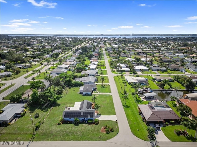 505 Monterey Ave, Cape Coral, FL 33904 - aerial perspective of suburban area featuring a large body of water