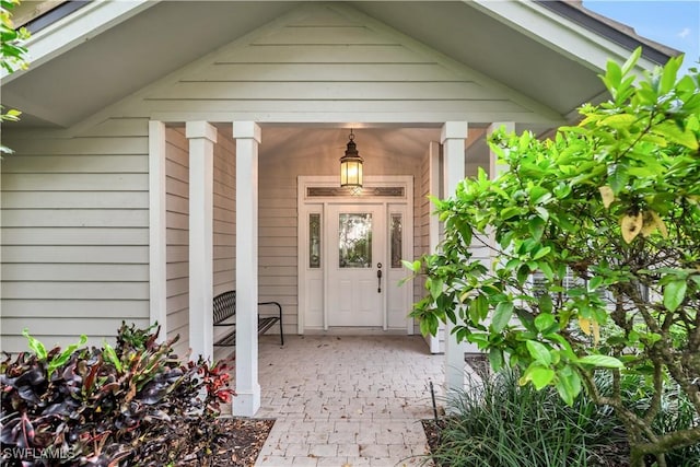858 Wyndemere Way, Naples, FL 34105 - property entrance featuring covered porch
