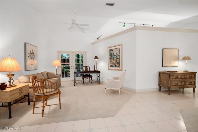 858 Wyndemere Way, Naples, FL 34105 - sitting room featuring french doors, ceiling fan, carpet, and high vaulted ceiling