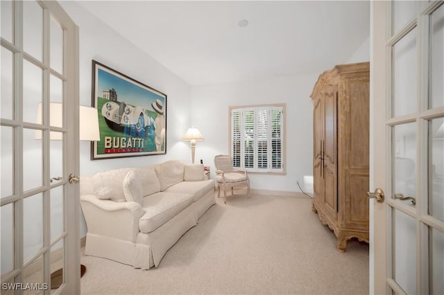 858 Wyndemere Way, Naples, FL 34105 - living room with french doors and carpet floors