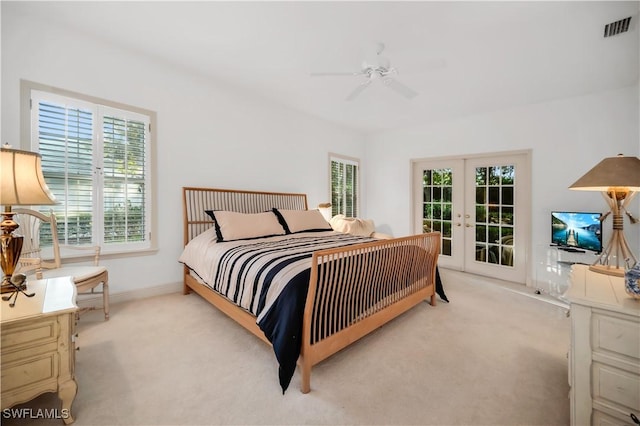 858 Wyndemere Way, Naples, FL 34105 - bedroom with carpet floors, multiple windows, access to exterior, and french doors