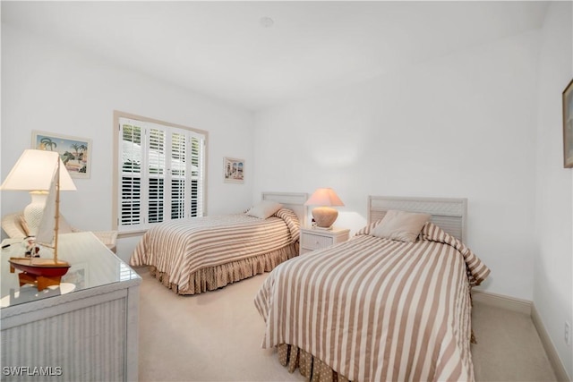 858 Wyndemere Way, Naples, FL 34105 - bedroom featuring carpet and baseboards