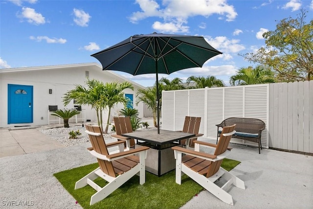 717 95th Ave N, Naples, FL 34108 - view of patio featuring outdoor dining space
