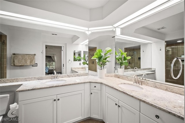 8701 Piazza Del Lago Cir Unit 101, Estero, FL 33928 - full bathroom with double vanity and a stall shower