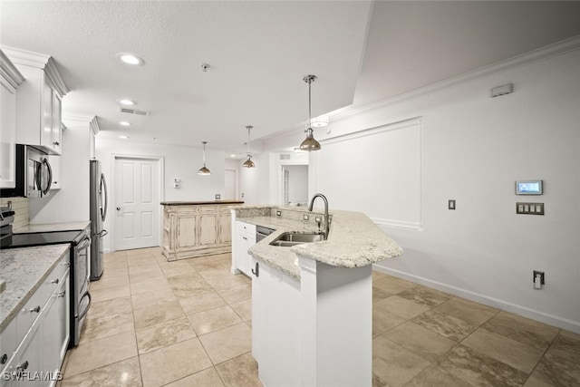 8701 Piazza Del Lago Cir Unit 101, Estero, FL 33928 - kitchen featuring appliances with stainless steel finishes, a spacious island, ornamental molding, recessed lighting, and pendant lighting