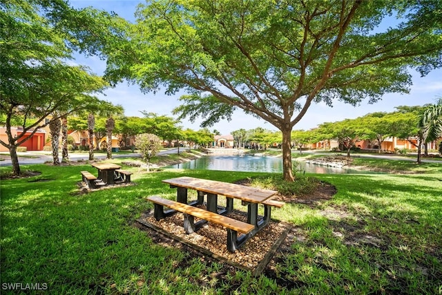 8701 Piazza Del Lago Cir Unit 101, Estero, FL 33928 - view of community featuring a lawn