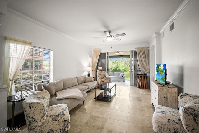 8701 Piazza Del Lago Cir Unit 101, Estero, FL 33928 - living room with crown molding, ceiling fan, and light tile patterned floors