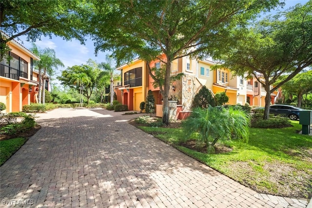8701 Piazza Del Lago Cir Unit 101, Estero, FL 33928 - view of decorative driveway