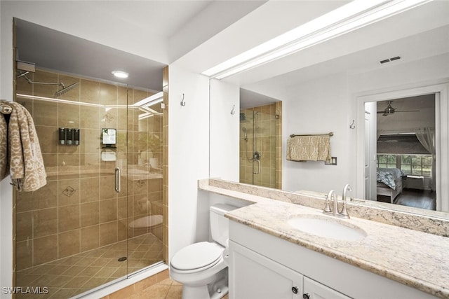 8701 Piazza Del Lago Cir Unit 101, Estero, FL 33928 - bathroom with ensuite bath, vanity, a stall shower, tile patterned floors, and a ceiling fan