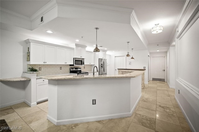 8701 Piazza Del Lago Cir Unit 101, Estero, FL 33928 - kitchen with appliances with stainless steel finishes, backsplash, a large island with sink, white cabinets, and ornamental molding