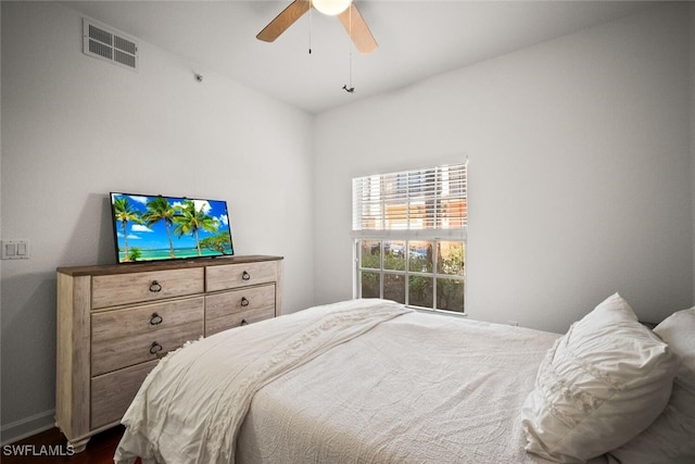 8701 Piazza Del Lago Cir Unit 101, Estero, FL 33928 - bedroom featuring ceiling fan and baseboards
