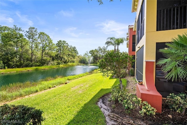 8701 Piazza Del Lago Cir Unit 101, Estero, FL 33928 - view of green lawn featuring a water view