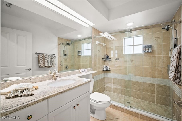 8701 Piazza Del Lago Cir Unit 101, Estero, FL 33928 - bathroom with plenty of natural light, a stall shower, vanity, tile patterned floors, and recessed lighting