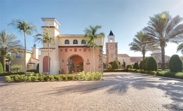 8701 Piazza Del Lago Cir Unit 101, Estero, FL 33928 - view of front facade with stucco siding
