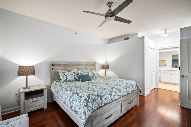 8701 Piazza Del Lago Cir Unit 101, Estero, FL 33928 - bedroom featuring dark wood finished floors and ceiling fan