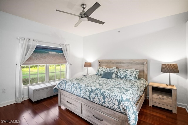 8701 Piazza Del Lago Cir Unit 101, Estero, FL 33928 - bedroom with wood finished floors and ceiling fan
