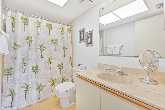 16200 Bay Pointe Blvd Unit 208, North Fort Myers, FL 33917 - bathroom with vanity, a skylight, and a shower with shower curtain