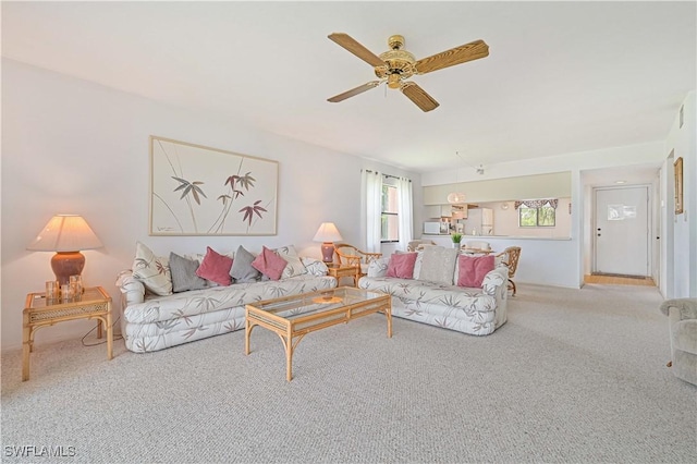 16200 Bay Pointe Blvd Unit 208, North Fort Myers, FL 33917 - carpeted living room featuring ceiling fan