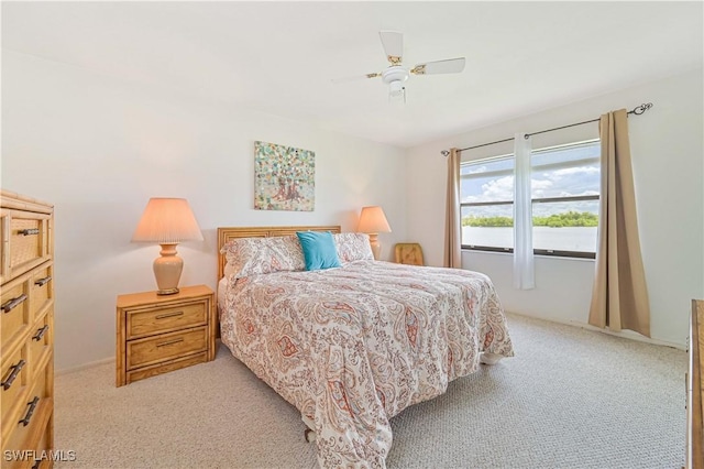 16200 Bay Pointe Blvd Unit 208, North Fort Myers, FL 33917 - bedroom with light colored carpet and a ceiling fan