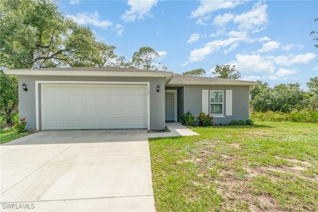159 Kirby St, Port Charlotte, FL 33954 - single story home featuring stucco siding, concrete driveway, an attached garage, and a front yard