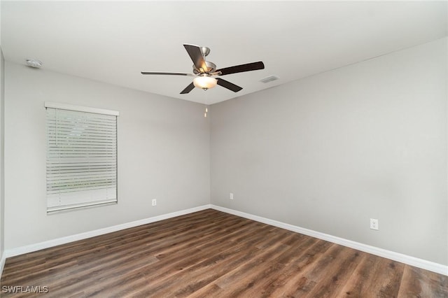 159 Kirby St, Port Charlotte, FL 33954 - unfurnished room with a ceiling fan and dark wood-type flooring