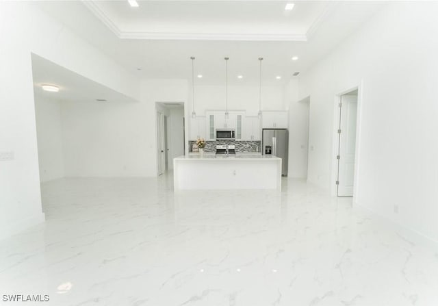 3923 NW 38th St, Cape Coral, FL 33993 - unfurnished living room featuring a raised ceiling, crown molding, recessed lighting, and light marble finish floors