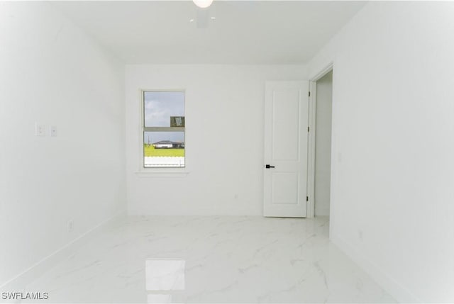 3923 NW 38th St, Cape Coral, FL 33993 - spare room featuring marble finish flooring and baseboards