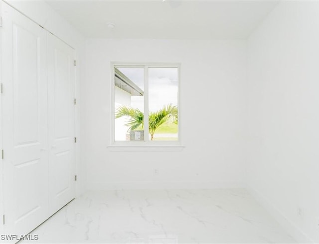 3923 NW 38th St, Cape Coral, FL 33993 - unfurnished bedroom with a closet and marble finish floors