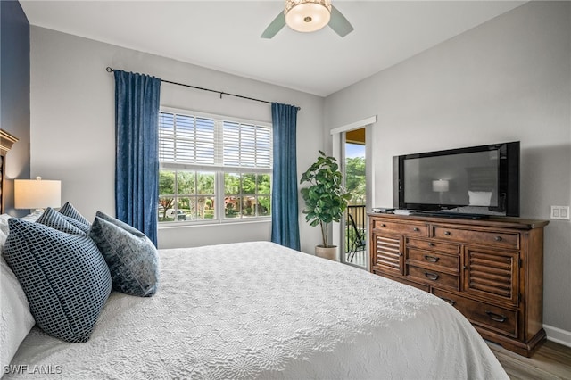 8608 Via Rapallo Dr Unit 206, Estero, FL 33928 - bedroom featuring wood finished floors and a ceiling fan
