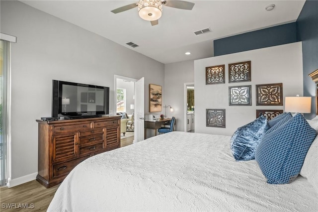 8608 Via Rapallo Dr Unit 206, Estero, FL 33928 - bedroom with wood finished floors, a ceiling fan, a desk, and recessed lighting
