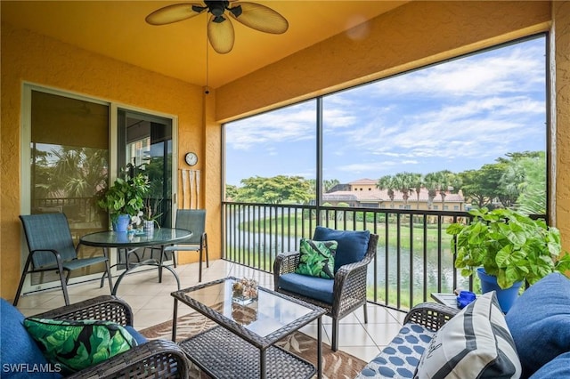 8608 Via Rapallo Dr Unit 206, Estero, FL 33928 - sunroom / solarium featuring a ceiling fan, a water view, and outdoor lounge area
