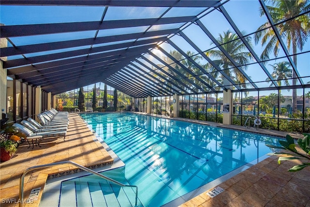 8608 Via Rapallo Dr Unit 206, Estero, FL 33928 - indoor pool featuring a lanai and a patio