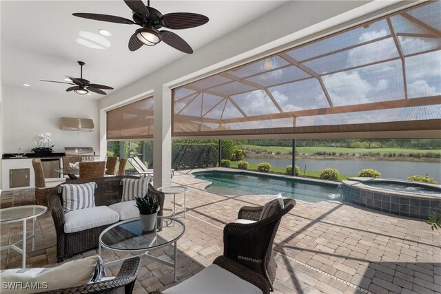8888 Savona Ct, Naples, FL 34119 - view of swimming pool featuring area for grilling, a water view, a patio, a ceiling fan, and a pool with connected hot tub