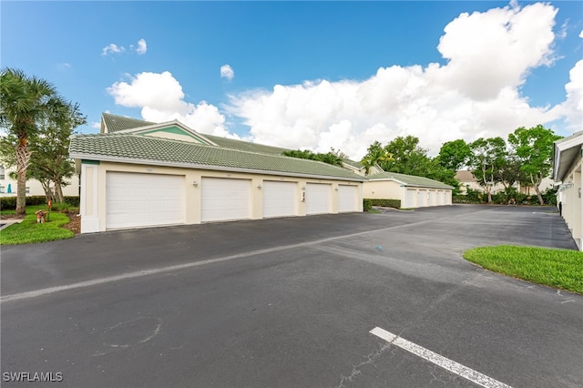 4940 Cougar Ct S Unit 104, Naples, FL 34109 - view of garage