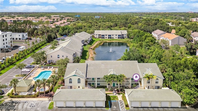 4940 Cougar Ct S Unit 104, Naples, FL 34109 - aerial view of a nearby body of water and a pool area