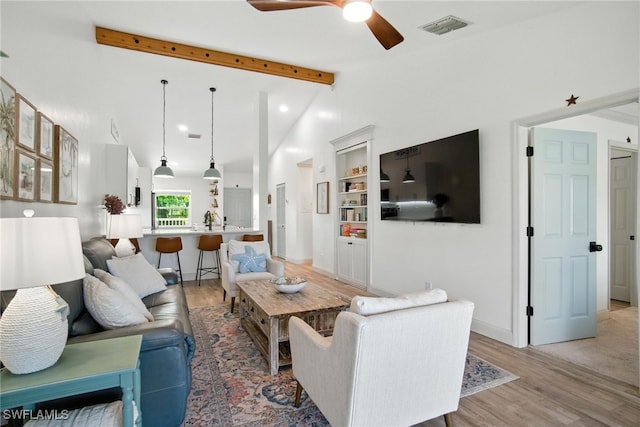 162 Pebble Shores Dr Unit 203, Naples, FL 34110 - living room with light wood-type flooring and ceiling fan