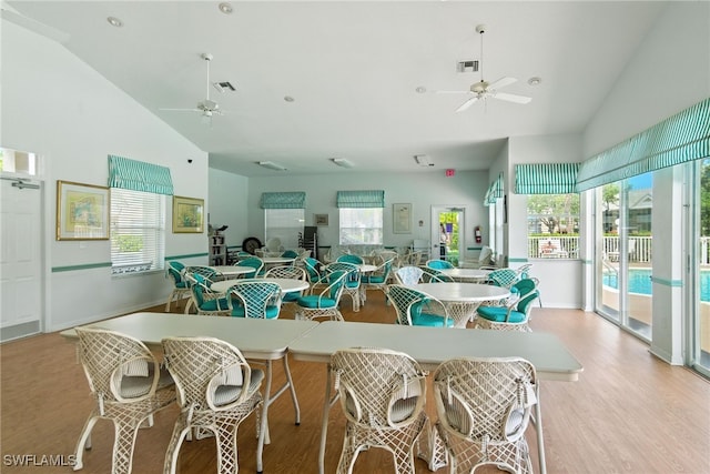 162 Pebble Shores Dr Unit 203, Naples, FL 34110 - kitchen with ceiling fan, high vaulted ceiling, and light wood-style flooring