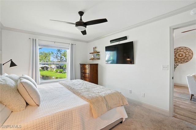 162 Pebble Shores Dr Unit 203, Naples, FL 34110 - bedroom featuring crown molding and a ceiling fan
