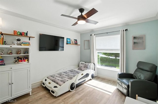 162 Pebble Shores Dr Unit 203, Naples, FL 34110 - bedroom with crown molding, light wood finished floors, and ceiling fan