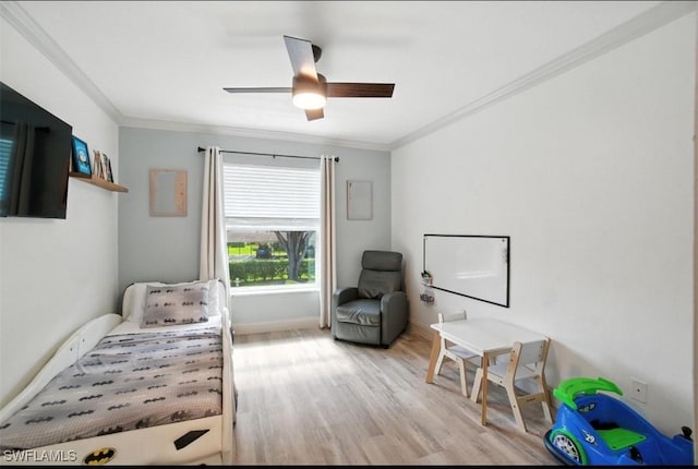 162 Pebble Shores Dr Unit 203, Naples, FL 34110 - bedroom featuring light wood-style flooring, crown molding, and ceiling fan
