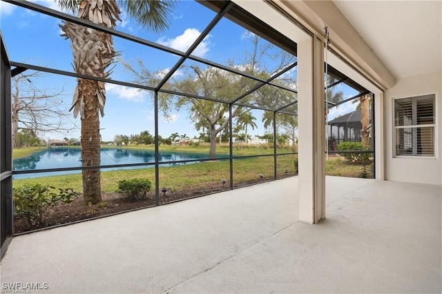 16409 Coco Hammock Way, Fort Myers, FL 34135 - unfurnished sunroom featuring a water view