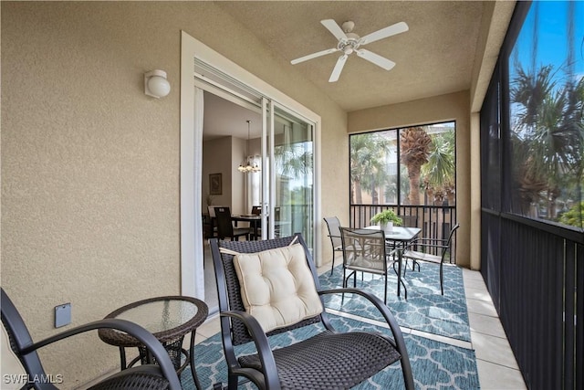 3724 Agualinda Blvd Unit 201, Cape Coral, FL 33914 - sunroom / solarium with ceiling fan and outdoor dining space