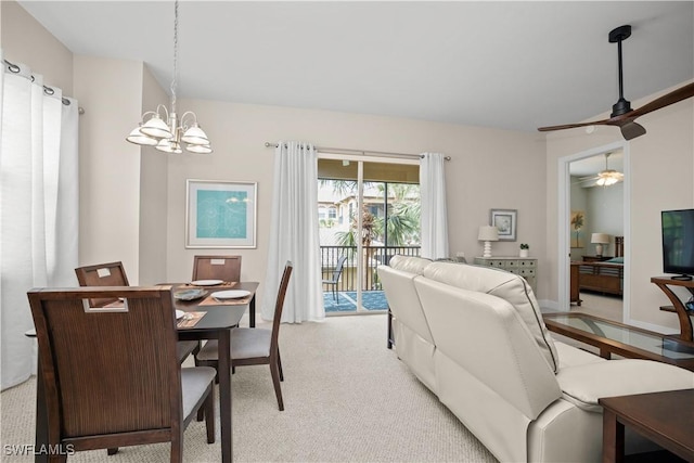 3724 Agualinda Blvd Unit 201, Cape Coral, FL 33914 - dining space with a chandelier, light carpet, and a ceiling fan