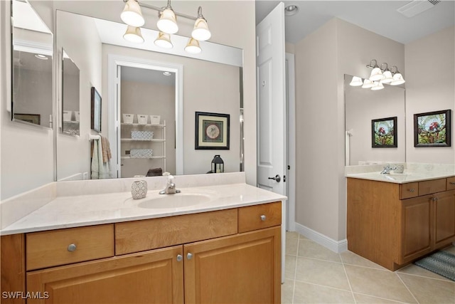 3724 Agualinda Blvd Unit 201, Cape Coral, FL 33914 - bathroom featuring tile patterned floors and two vanities