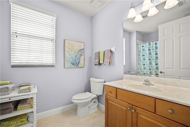 3724 Agualinda Blvd Unit 201, Cape Coral, FL 33914 - bathroom featuring vanity, plenty of natural light, and tile patterned flooring